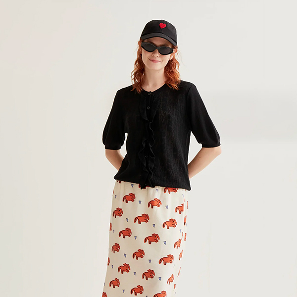 Cárdigan-punto-negro-volante